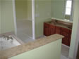 Custom vanities, granite, glass block and tile are an RBA modular home specialty