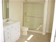 One piece shower bath fixtures with glass doors are easy to clean in the Monmouth County, Oceanport, NJ home