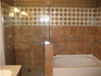 RBA Homes works with the customer to design and install tile as shown in this custom bathroom