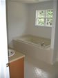 Octagon floor tile enhance the 2nd floor hall bath of this Monmouth County, Neptune, NJ modular home