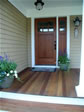 Beautiful solid wood stained recessed front entry door enhances this Monmouth County, Monmouth Beach, NJ home