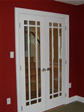 Double french interior doors with decorative grills luxuriously enhance any room, in any home