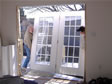 Installation of a french door that will lead to a 2nd floor balcony overlooking the inlet