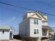 This rear shed dormer placed on this Ocean County, Lavallette, NJ home has views overlooking the water