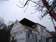 Lifting the modular roof section of this second story home in Ocean County, NJ