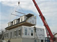 Installation of the factory built second level cape dormers of a home in Monmouth County, Atlantic Highlands, NJ